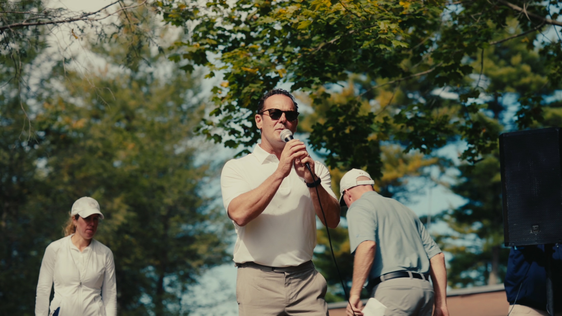 Tournament host addressing the field