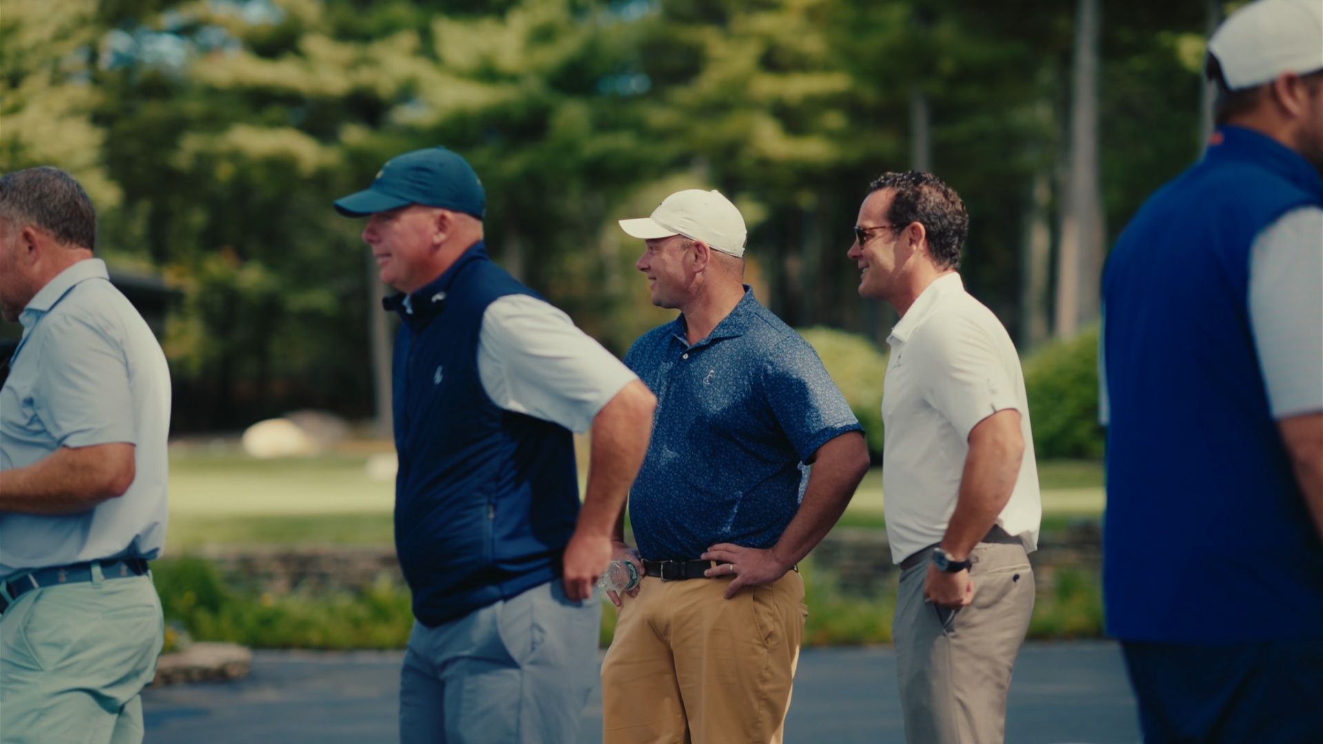 Players sharing a laugh before tee-off