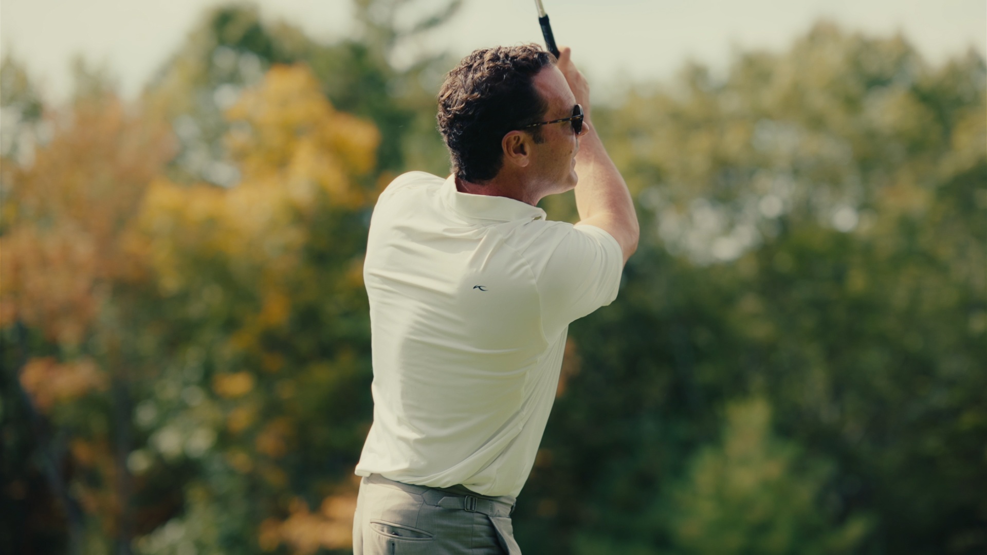 Smooth follow-through against the fall trees